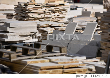 Stacked limestone slabs and tiles Stacked limestone slabs and tiles 114241592
