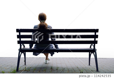 Pretty girl sitting on the bench 114242535