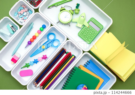School supplies.Concept back to school. colored stationery is arranged in white organizers. Creative Drawer Organizing. Storage office supplies 114244666