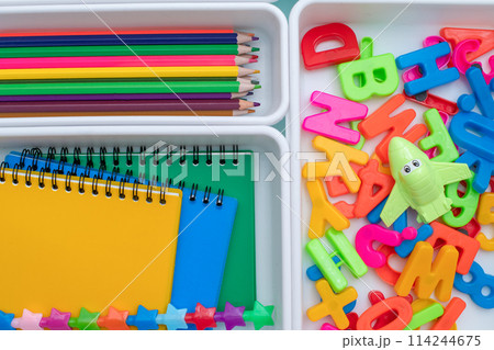School supplies.Concept back to school. colored stationery is arranged in white organizers. Creative Drawer Organizing. Storage office supplies School supplies.Concept back to school. colored stationery is arranged in white organizers. Creative Drawer Organizing. Storage office supplies 114244675