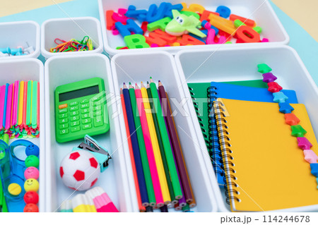 School supplies.Concept back to school. colored stationery is arranged in white organizers. Creative Drawer Organizing. Storage office supplies 114244678