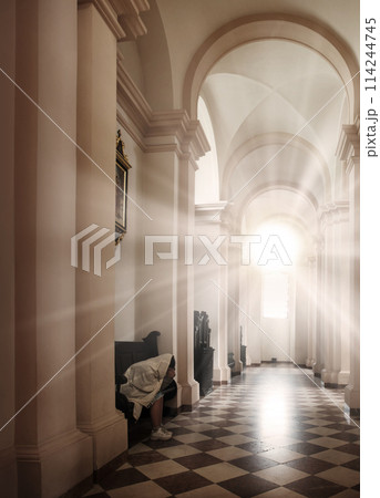 Girl sit on the bench in the church 114244745