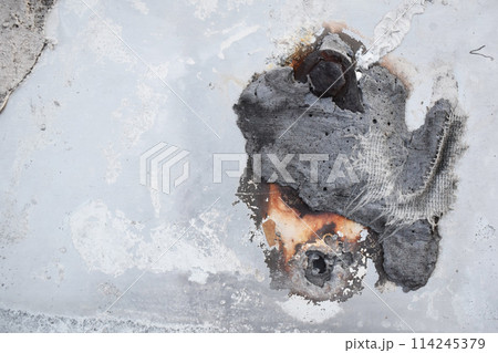Dusty peeling paint wall background, texture of a concrete old wall with stains and cracks 114245379
