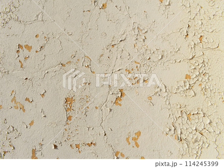 Dusty peeling paint wall background, texture of a concrete old wall with stains and cracks 114245399