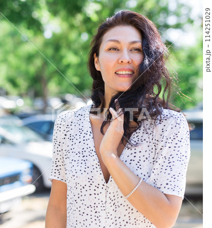 Portrait of adult Asian woman in dress Portrait of adult Asian woman in dress 114251029