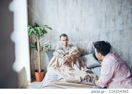 Gay couple at home, intimate moments of private life - Homosexual partners Gay couple at home, intimate moments of private life - Homosexual partners 114254365