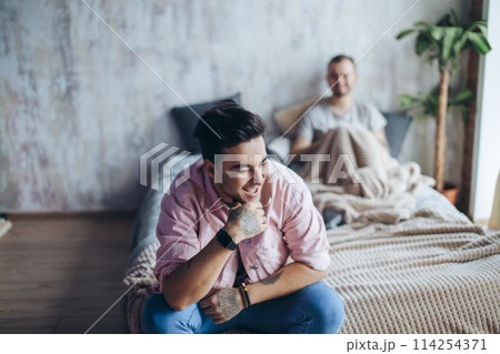 Gay couple at home, intimate moments of private life - Homosexual partners Gay couple at home, intimate moments of private life - Homosexual partners 114254371