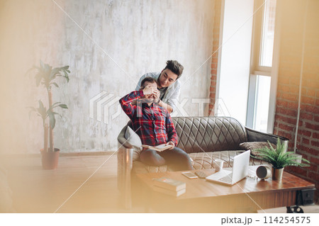 Cay couple enjoy togetherness indoors, kiss each other 114254575
