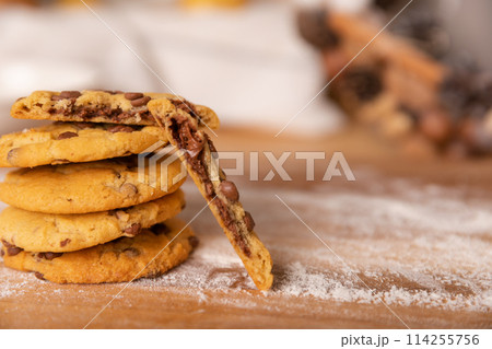 Home made giant cookies on wooden table with pieces of star anise and cinnamon 114255756