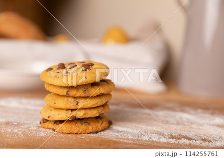 Home made giant cookies on wooden table with pieces of star anise and cinnamon 114255761