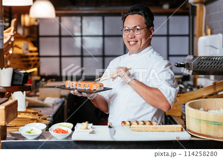 happy chef taking part on TV show 114258280
