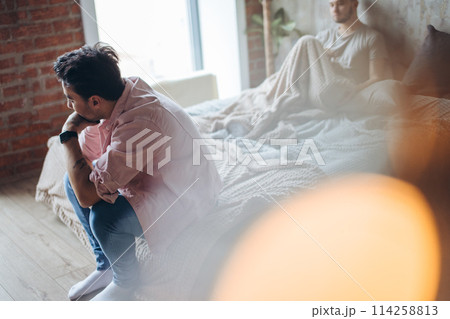 Young gay couple in quarrel at home. LGBT concept Young gay couple in quarrel at home. LGBT concept 114258813