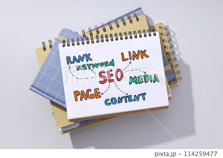 Notepads and diagram on light background, top view 114259477