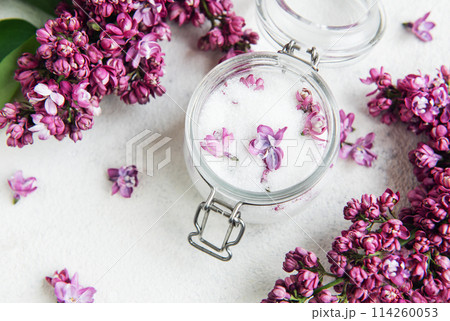 Lilac sugar in glass jar and fresh flowers Lilac sugar in glass jar and fresh flowers 114260053