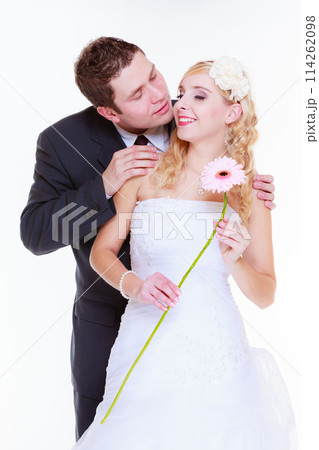 Happy groom and bride posing for marriage photo Happy groom and bride posing for marriage photo 114262098