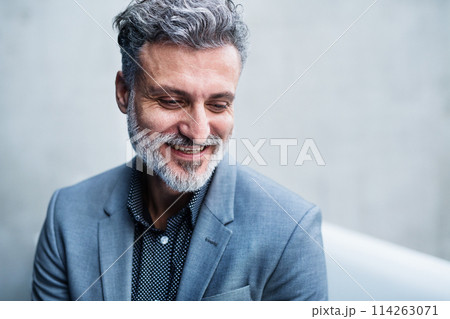 Handsome businessman in modern office space, portrait, headshot. Handsome businessman in modern office space, portrait, headshot. 114263071