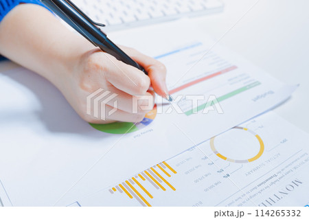 work and learn online in new normal concept from woman writing on business document 114265332
