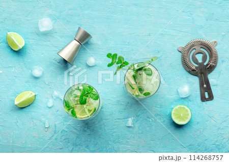 Mojito cocktail. Summer cold drink with lime, fresh mint, and ice. Cool beverage 114268757