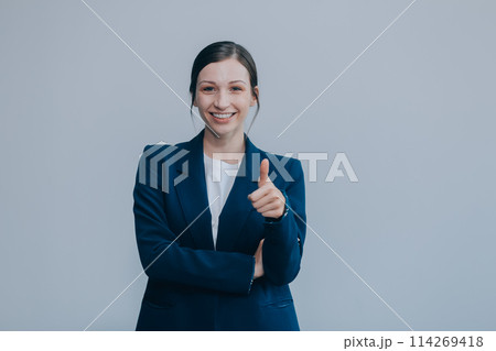 Successful young asian businesswoman in suit ready do business, cross arms confident and smiling. Female entrepreneur determined to win. Happy saleswoman talking to clients, white background 114269418