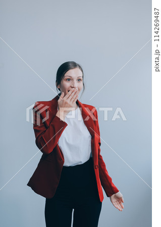 Happy young businesswoman on white background 114269487