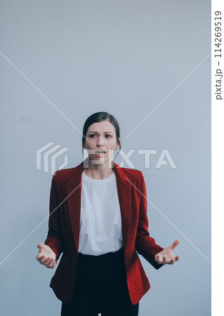 Young woman has headache, isolated on gray background. Young woman has headache, isolated on gray background. 114269519