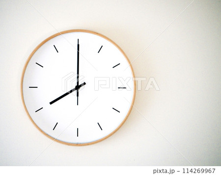 Isolated on white background Minimalist style wooden wall clock, showing time at 8.00 or 20.00 Isolated on white background Minimalist style wooden wall clock, showing time at 8.00 or 20.00 114269967