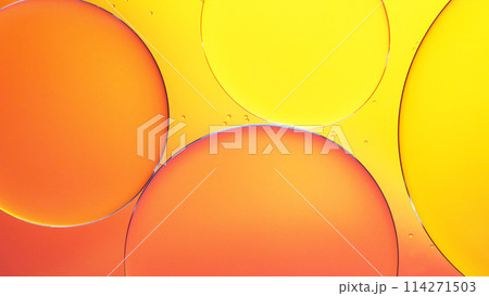 Close up of oil on water orange to yellow gradient abstract background 114271503
