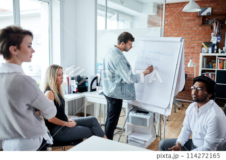 architects are discussing the plan 114272165