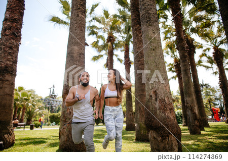 Young couple running Young couple running 114274869