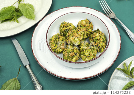 Vegan green nettle cutlets. 114275228