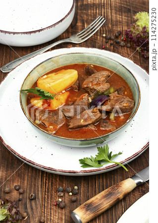 Roast venison with potatoes. Roast venison with potatoes. 114275230
