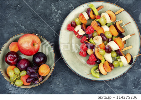 Fruit sweet kebabs. 114275236