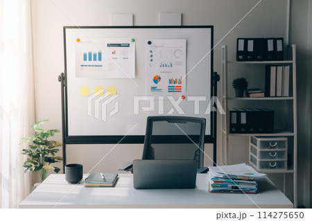 Office workplace with laptop and smart phone on wood table 114275650