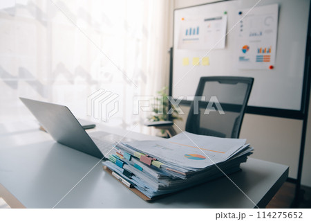 Office workplace with laptop and smart phone on wood table Office workplace with laptop and smart phone on wood table 114275652