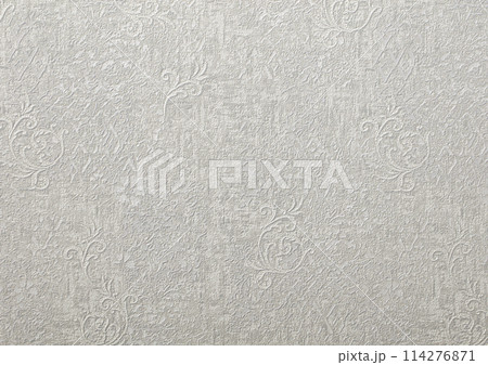 Background of gray wallpaper or plastered wall with a swirl pattern. Background of gray wallpaper or plastered wall with a swirl pattern. 114276871