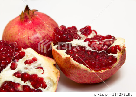 Purified pomegranate fruit on a white background 114278196