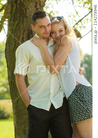 Happy couple having romantic date in park Happy couple having romantic date in park 114278946