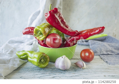 fresh ripe assorted vegetables for cooking dinner on a wooden rustic table 114280250
