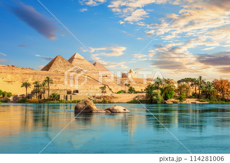 Ancient rocks in the Nile on the way to pyramids, Aswan, Egypt Ancient rocks in the Nile on the way to pyramids, Aswan, Egypt 114281006