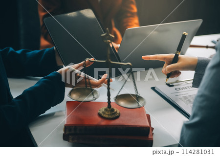Businessman and lawyer discuss the contract document. Treaty of the law. Sign a contract business. 114281031