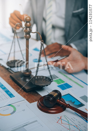Consultation and conference of lawyers and professional businessman working and discussion having at law firm in office. Concepts of law, Judge gavel with scales of justice. Consultation and conference of lawyers and professional businessman working and discussion having at law firm in office. Concepts of law, Judge gavel with scales of justice. 114281077