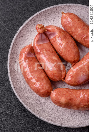 Baked chicken or pork sausages, salt, spices and herbs Baked chicken or pork sausages, salt, spices and herbs 114281804