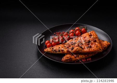 Slices of delicious street pizza with sausage, mushrooms, tomatoes 114281946