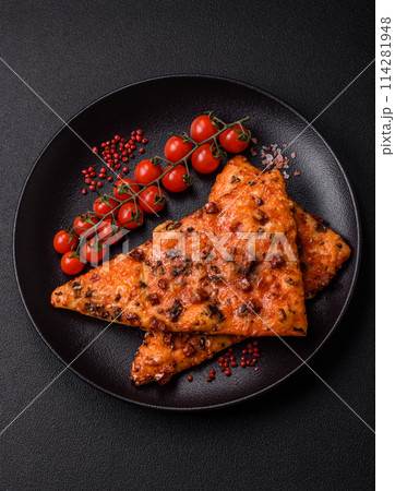 Slices of delicious street pizza with sausage, mushrooms, tomatoes Slices of delicious street pizza with sausage, mushrooms, tomatoes 114281948