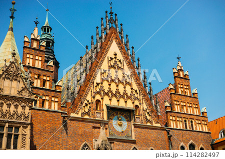 Museum of Bourgeois Art. Clock at the Town Hall Square in Wroclaw, Poland. Polish landmark in the historic center of town 114282497
