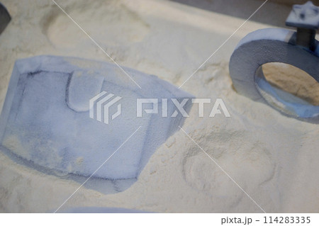 White polyamide powder and object on 3D printed from white polyamide powder close-up. Polyamide powder for creating objects on 3D printer. Additive MJF Multi Jet Fusion technologies. Thermoplastic 114283335