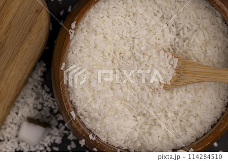 white coconut pulp and dried coconut flakes white coconut pulp and dried coconut flakes 114284510