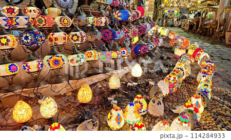 Colorful mosaic lamps, exposed in the evening on the street 114284933