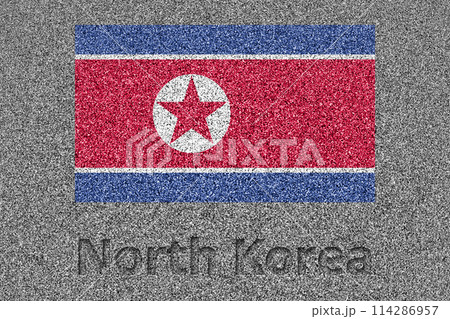 石板の上に描かれた北朝鮮の国旗と、掘ったような「North Korea」の文字 石板の上に描かれた北朝鮮の国旗と、掘ったような「North Korea」の文字 114286957
