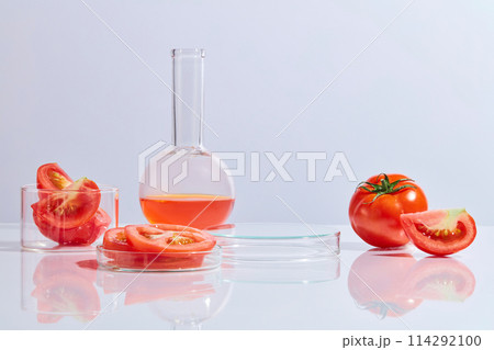 The photography of lab concept with tomato as the main composition, blank podium in the middle for displaying product. Front view, space for text The photography of lab concept with tomato as the main composition, blank podium in the middle for displaying product. Front view, space for text 114292100